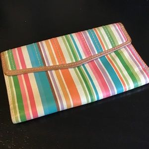 Like new.Fossil wallet  leather striped.these colors have a fun Florida vibe!!🏝